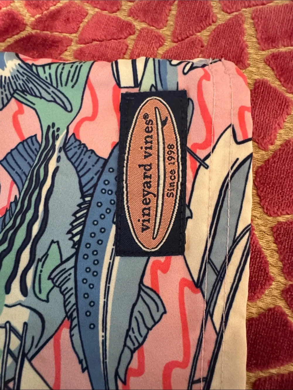 Vineyard Vines Boys Fish Print Swim Trunks in Coral, Blue & Cream medium